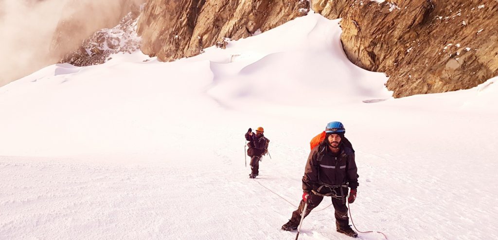 Hiking to Margherita peak atop Mt. Stanley on Rwenzori mountains. Credit Sima Safaris