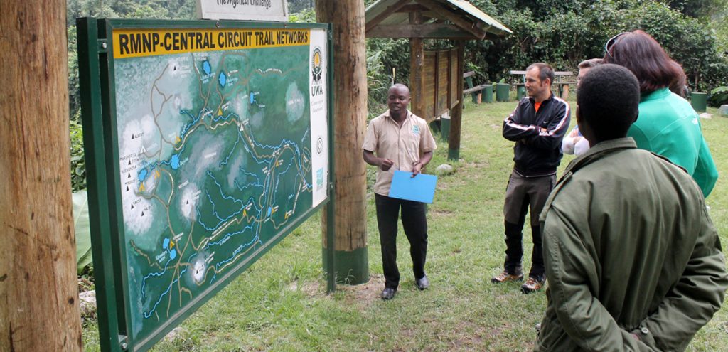 Briefing before hiking Rwenzori central circuit trail, one of the different Rwenzori Trekking Trails