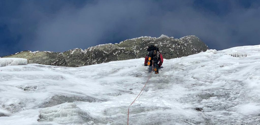 Hiking to the top of Rwenzori Mountains, part of Rwenzori Hike and Gorilla Trek safari. Credit: Sima Safari